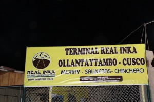 Yellow bus stop sign, Real Inka Colectivo Terminal in Ollantaytambo
