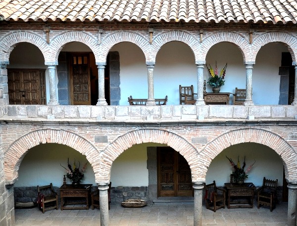 Moorish arches surround the patio at Inkaterra La Casona Hotel in Cusco, Peru