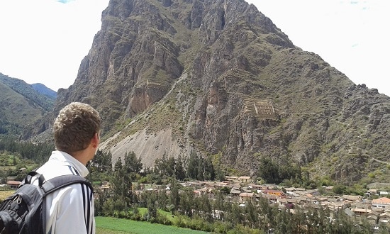 Carved face of Wiracocha and storehouses