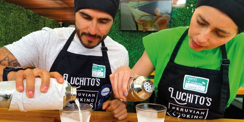 making pisco at luchitos