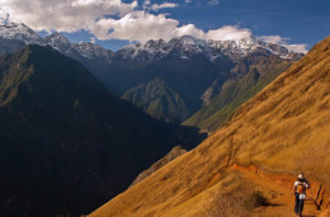 Crisp scrubland transitions to snow capped peaks on the Vilcabamba Traverse Route